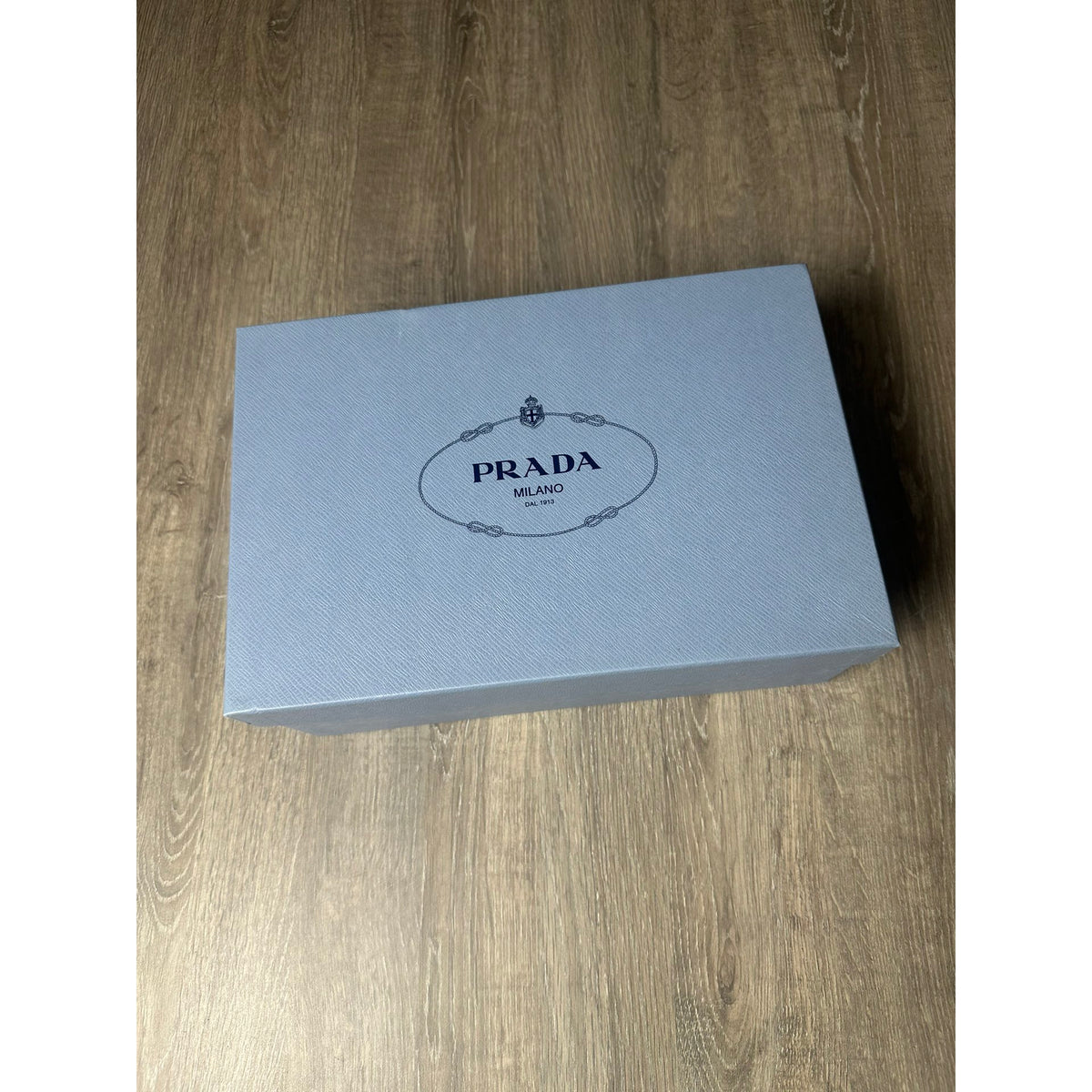 Prada Mocassins en cuir verni chocolate Blanc 38.5