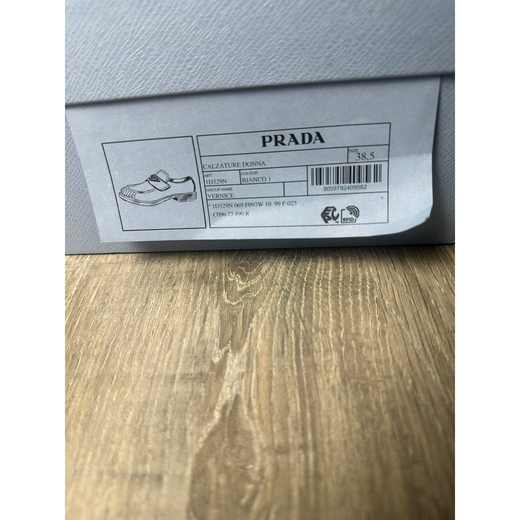 Prada Mocassins en cuir verni chocolate Blanc 38.5